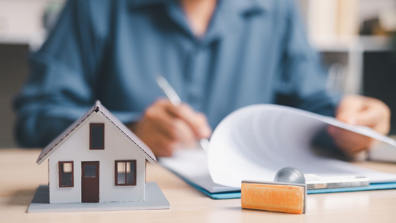 Property%20manager%20reviewing%20tenant%20application Property%20manager%20reviewing%20tenant%20application